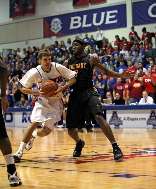 DRIVING THE LANE â€” Sophomore guard Simon McCormack powers through the paint during AUâ€™s 51-50 loss to Albany.  Itâ€™s The Eaglesâ€™ second straight loss  of the year, dropping them to 0-2 on the season. Despite having a 33-27 halftime lead, AU was unable to hold on for the victory. 
