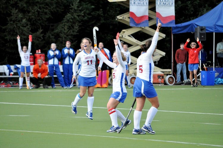 CELEBRATION â€” AU field hockey players celebrate during their 6-2 victory over Lafayette College in the Patriot League Tournament final. This is the Eaglesâ€™ eighth straight PL title. 