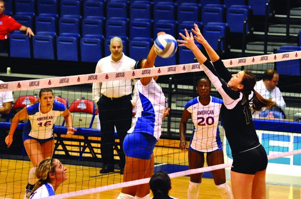 SLAMMIN\' IT DOWN â€” Sophomore middle blocker Bianca Richardson goes for the spike in a match from earlier in the year. The Eagles traveled to Bucknell and Colgate to pick up a pair of Patriot League wins. 