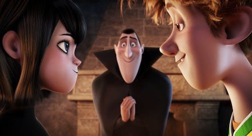 Dracula (Adam Sandler) looks on nervously as his daughter Mavis (Selena Gomez) and the human boy Jonathan (Andy Samberg) share an intimate moment in HOTEL TRANSYLVANIA, an animated comedy from Sony Pictures Animation. 