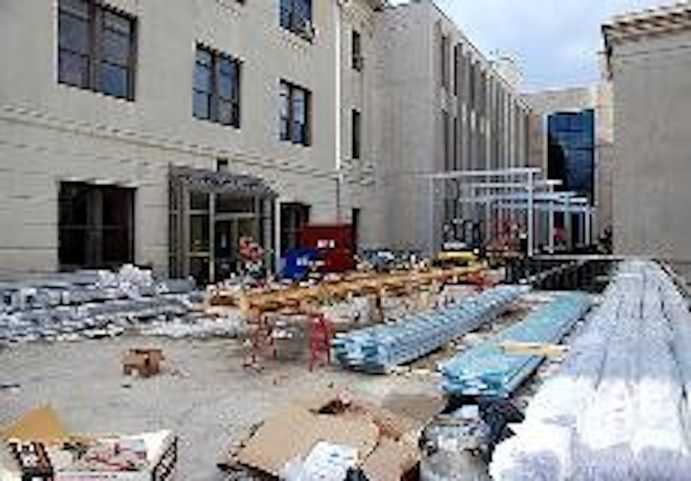 BUILT UP - The cover for the bridged walkway next to Mary Graydon Center is slated to be complete by Feb. 15. This is one of four projects currently underway at AU. The new School of International Service building, the Kogod School of Business expansion a