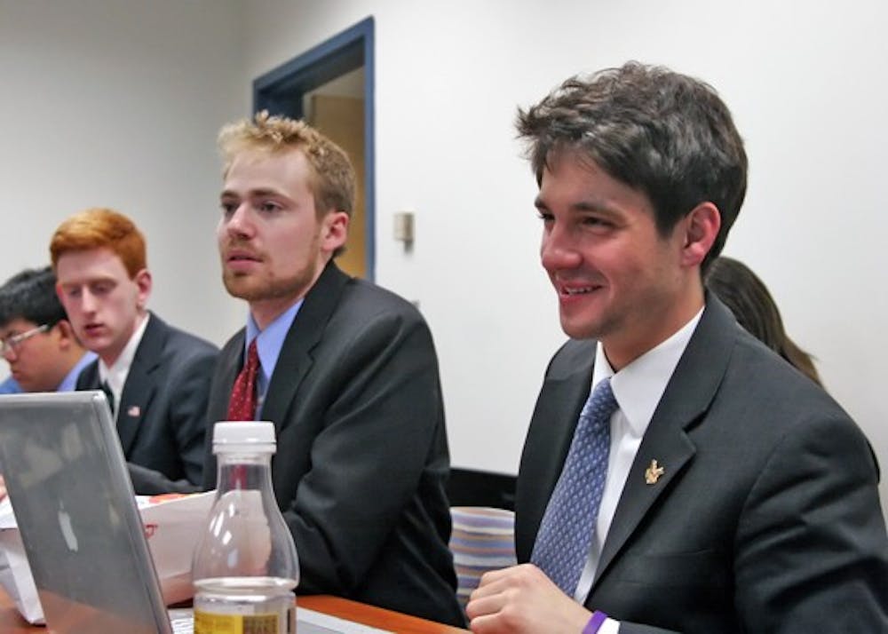 A NEW AU â€” Nate Bronstein, right, sitting with Student Government President Andy MacCracken was elected SG president March 24. Bronsteinâ€™s plans for AU include improving AUâ€™s sense of community and making better connections with other colleges in D.C.