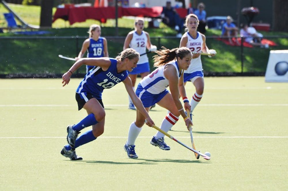 DUKE NUKEM â€” Christine Fingerhuth dribbles past a Duke University player. Fingerhuth scored AUâ€™s third goal in the victory.