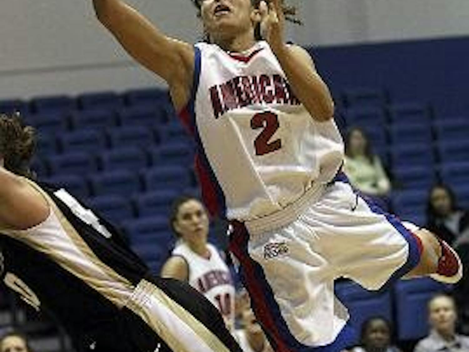 LEANER - Senior guard Talicia Jackson leans into score two of her ten points during Wednesday's 60-58 overtime loss to Army. Jackson hit a bucket with 14 seconds remaining to send the game into the extra frame but missed two key free-throws with less than