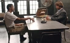 BIG PIMPIN' - Denzel Washington (left) and Russell Crowe face off against each other in "American Gangster," the latest film by director Ridley Scott. Washington plays a drug lord who smuggles heroin in the coffins of dead soldiers returning to the United