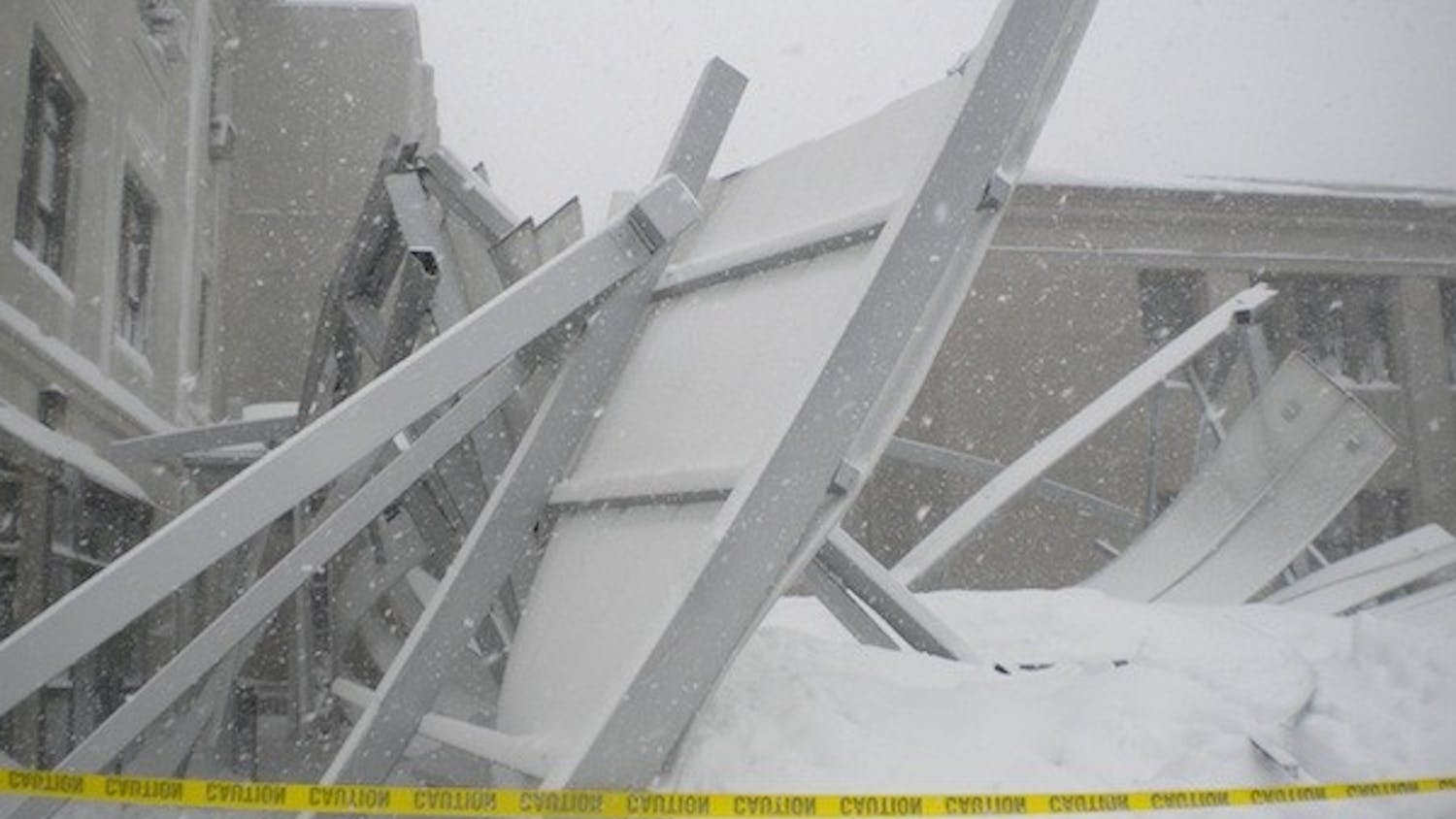 UNDER PRESSURE â€” The recently-built canopy between Mary Graydon Center and the Battelle-Tompkins building collapsed Wednesday under the weight of last weekâ€™s two snowstorms. No injuries were reported.
