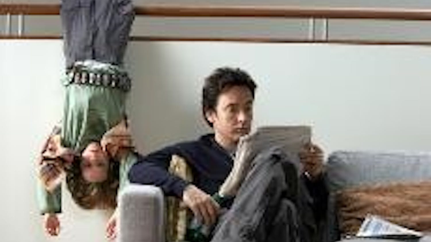 DENNIS THE MENACE - Science fiction novelist David (John Cusack) fulfills his late wife's wish to adopt Dennis (Bobby Coleman), who believes he's from Mars, in "Martian Child," the latest film by director Menno Meyjes.