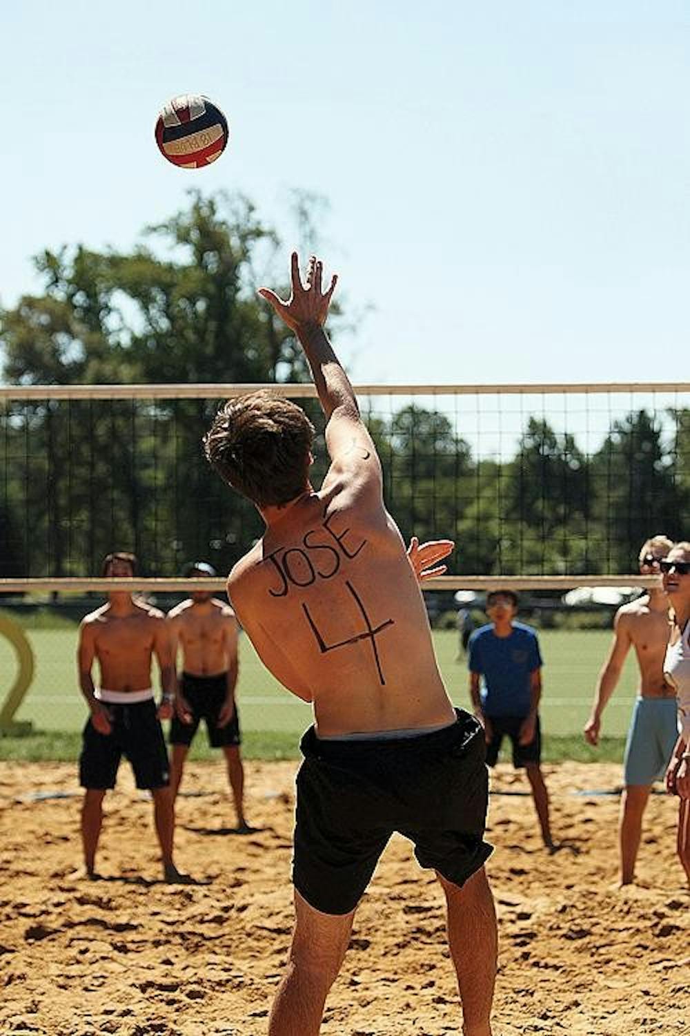 AU students enjoy the sun during a volleyball game at the 3rd Annual Sandslam, hosted by the Chi Omega sorority Sunday afternoon. All proceeds from the tournament  will be going to the Make-A-Wish Foundation.