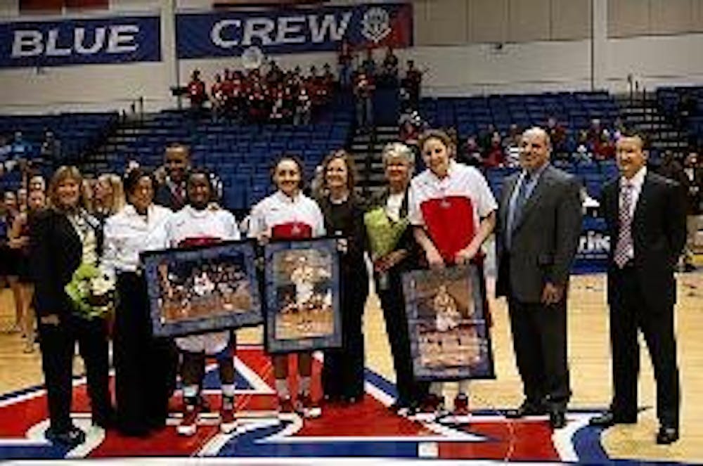 HOME FINALE- Seniors Pam Stanfield, Talicia Jackson and Sahar Nusseibeh are honored in a ceremony celebrating their careers during  the teams' last home game on Saturday against Lafayette College (above).  Freshman guard Lisa Strack (below) goes strong to
