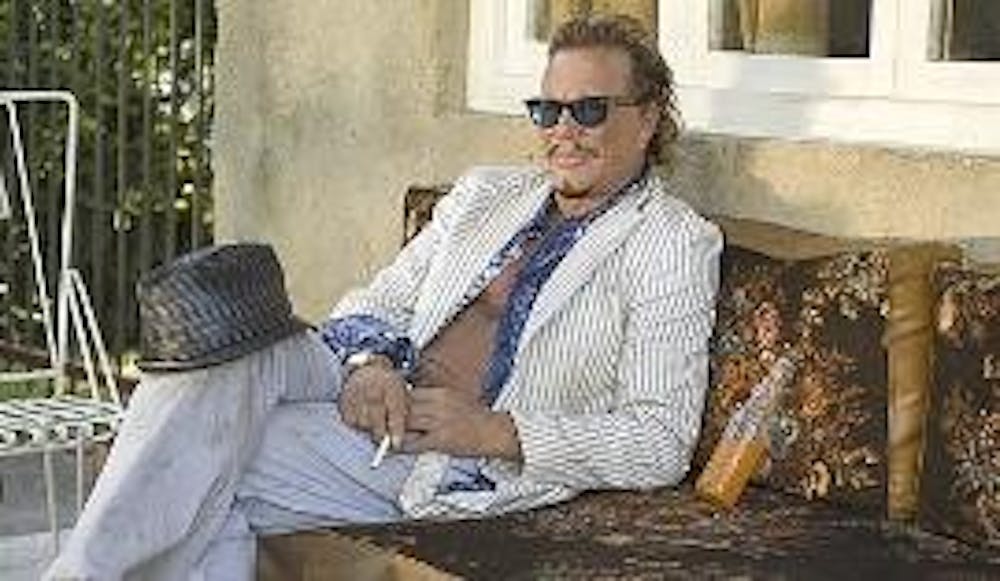HEAR ME ROURKE - Mickey Rourke's acting talent is undermined in his new film, "The Informers." Though the entire movie is stacked with sex, drugs and rock star antics, all the ingredients for a good movie are lacking. The film lacks a plot, its writing is