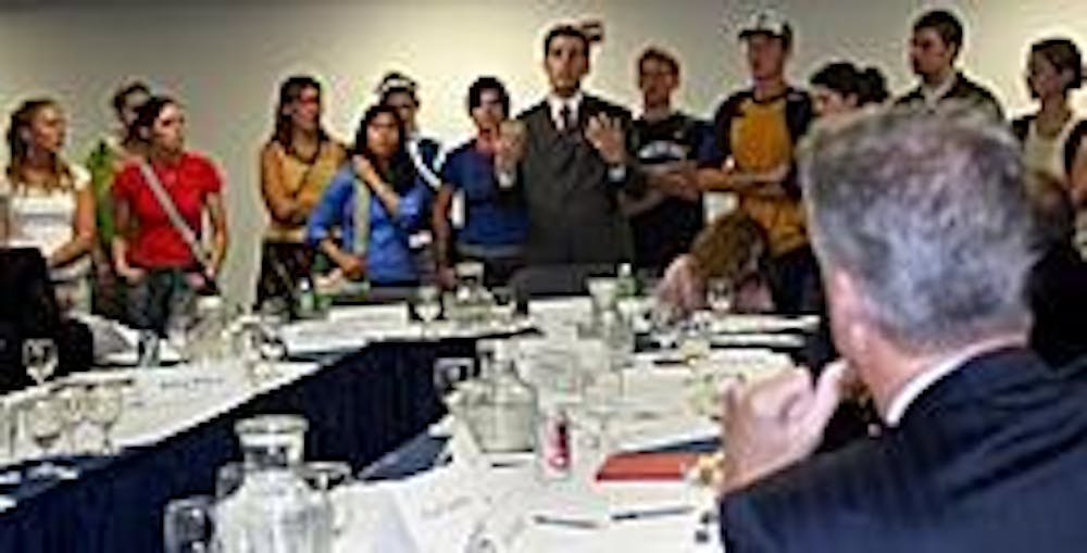 2005 SG President Kyle Taylor addresses trustees at a meeting last year after over 500 students protest