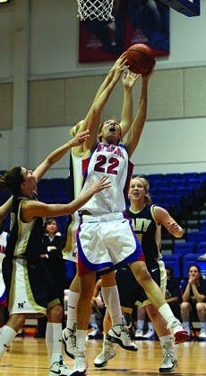 LAYING UP - Sophomore forward Liz Leer goes up for a layup in last night's game against Navy, scoring two of her 18 points of the night.  The effort was not enough to prevent a 68-61 loss for the Eagles. 