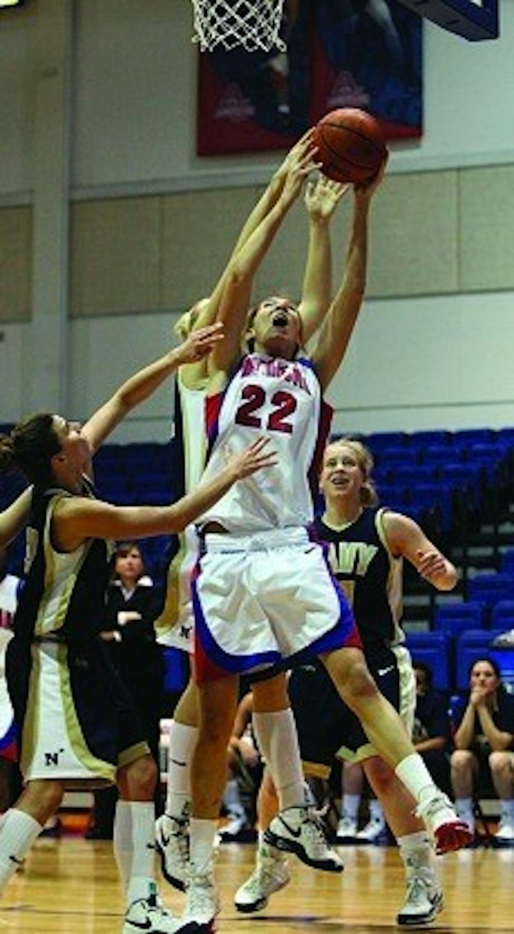 LAYING UP - Sophomore forward Liz Leer goes up for a layup in last night's game against Navy, scoring two of her 18 points of the night.  The effort was not enough to prevent a 68-61 loss for the Eagles. 