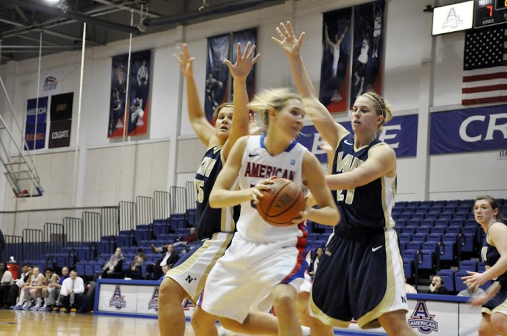 TIGHT SPOT â€” Liz Leer tries to get by two Navy defenders in a game from last week. Over the weekend, AU defeated Lafayette to gain sole posession of second place in the Patriot League.
