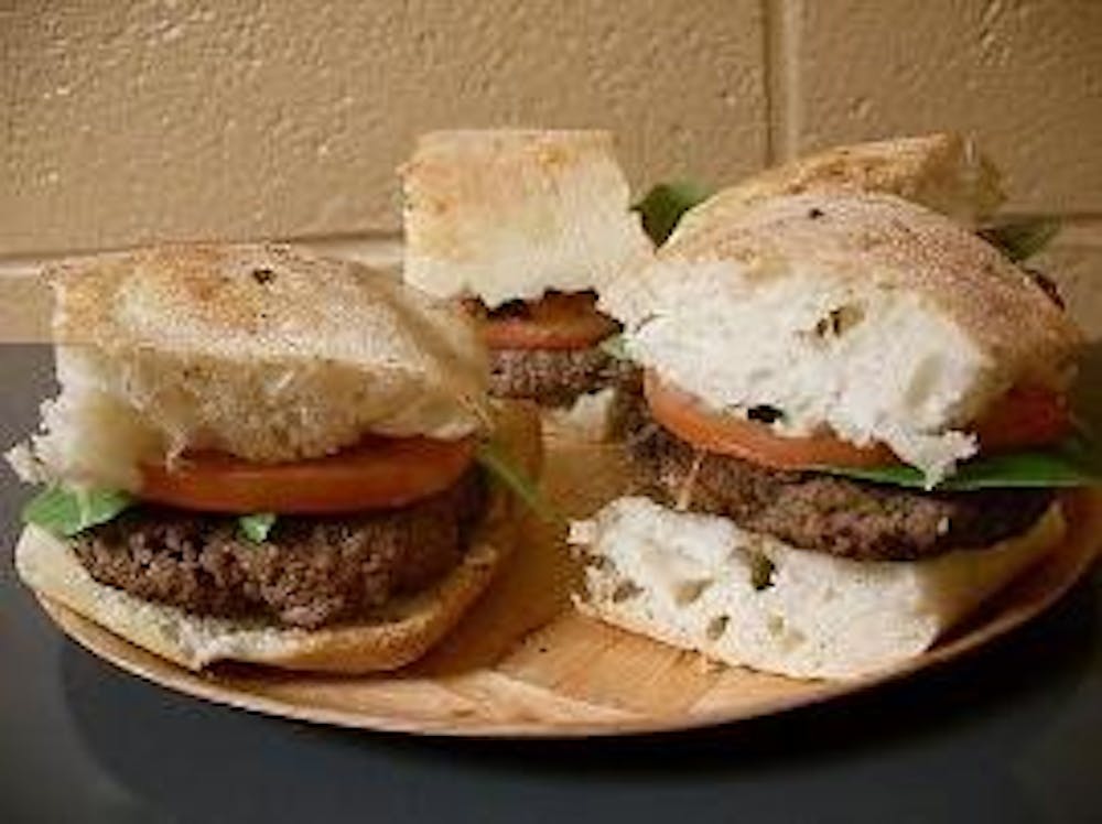 GOOD EATS - Making hamburgers has always been an easy dinner solution, but not always an interesting one. These patties, made with garlic and onion sit pretty on a ciabatta roll. Unlike your run-of-the-mill burger, these are flavorful and fancy. They're e