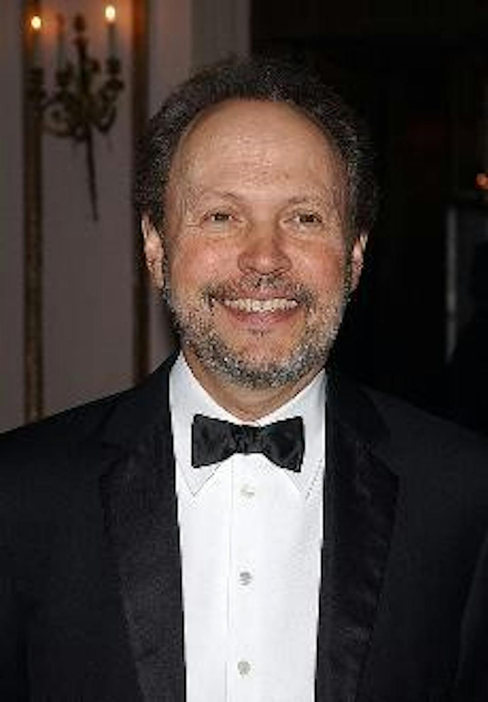 NEW CLEATS TO FILL - Though a very accomplished actor, acting like a baseball player will not guarantee Billy Crystal a hit in his career with the Yankees. Crystal was signed to a three-year contract this year.