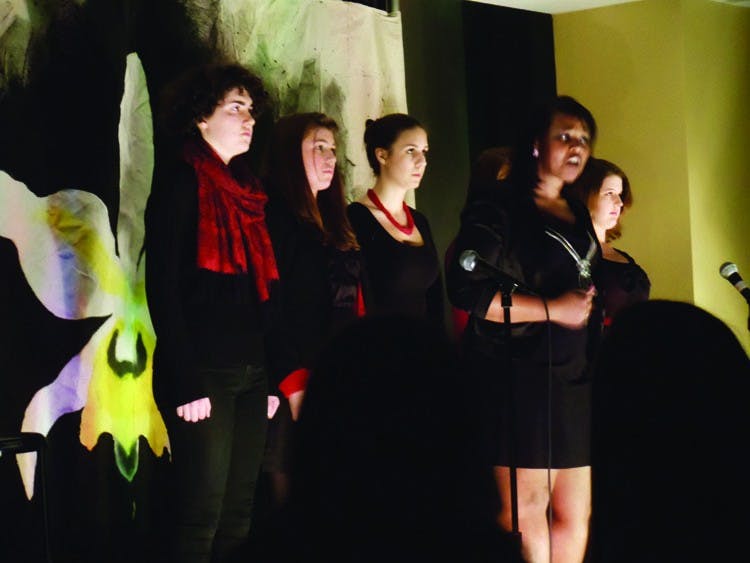 WOMENâ€™S WORDS â€” Starr Brainard, left, Tori Disston, Alyssa Trempus, Christine Edmond, front, Bridget Burns, hidden and Chelsea Cohen act in the Feb. 18 performance of â€œVagina Monologues.â€ 