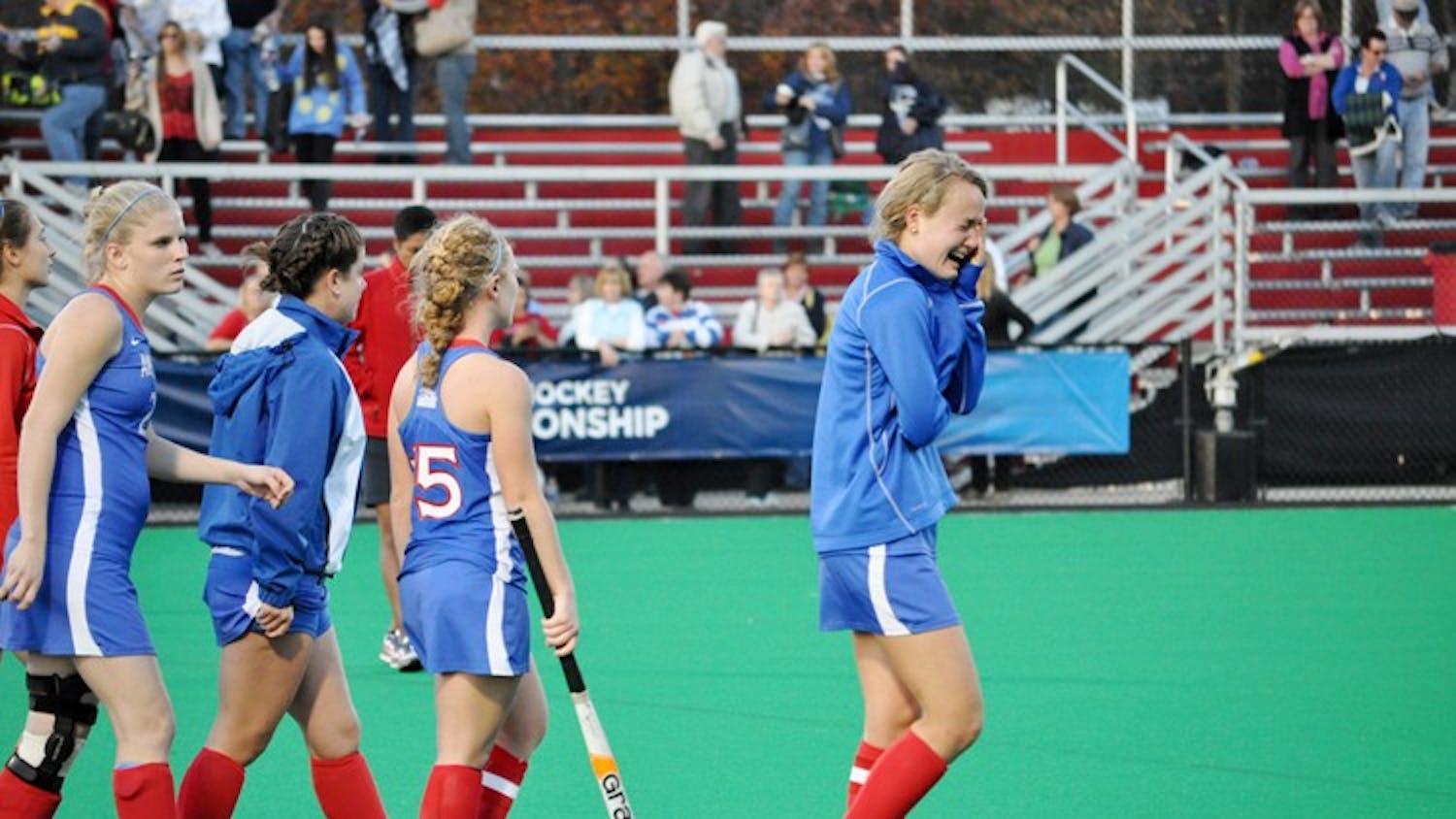 TOUGH LOSS — The AU field hockey team reacts after losing to UConn in the first round of the NCAA tournament, 3-2. The Eagles lost in a stroke-off after two overtimes.