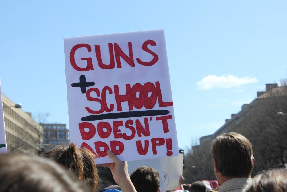 AU students join calls to end gun violence at March for Our Lives