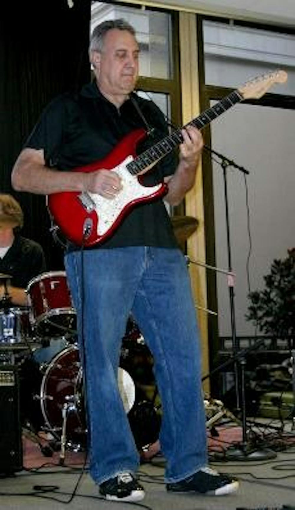 MAKIN' MUSIC- Mark Caruso jams on guitar, covering B.B. King with Ivers' band Zeebop in the first installment of the KPU series.