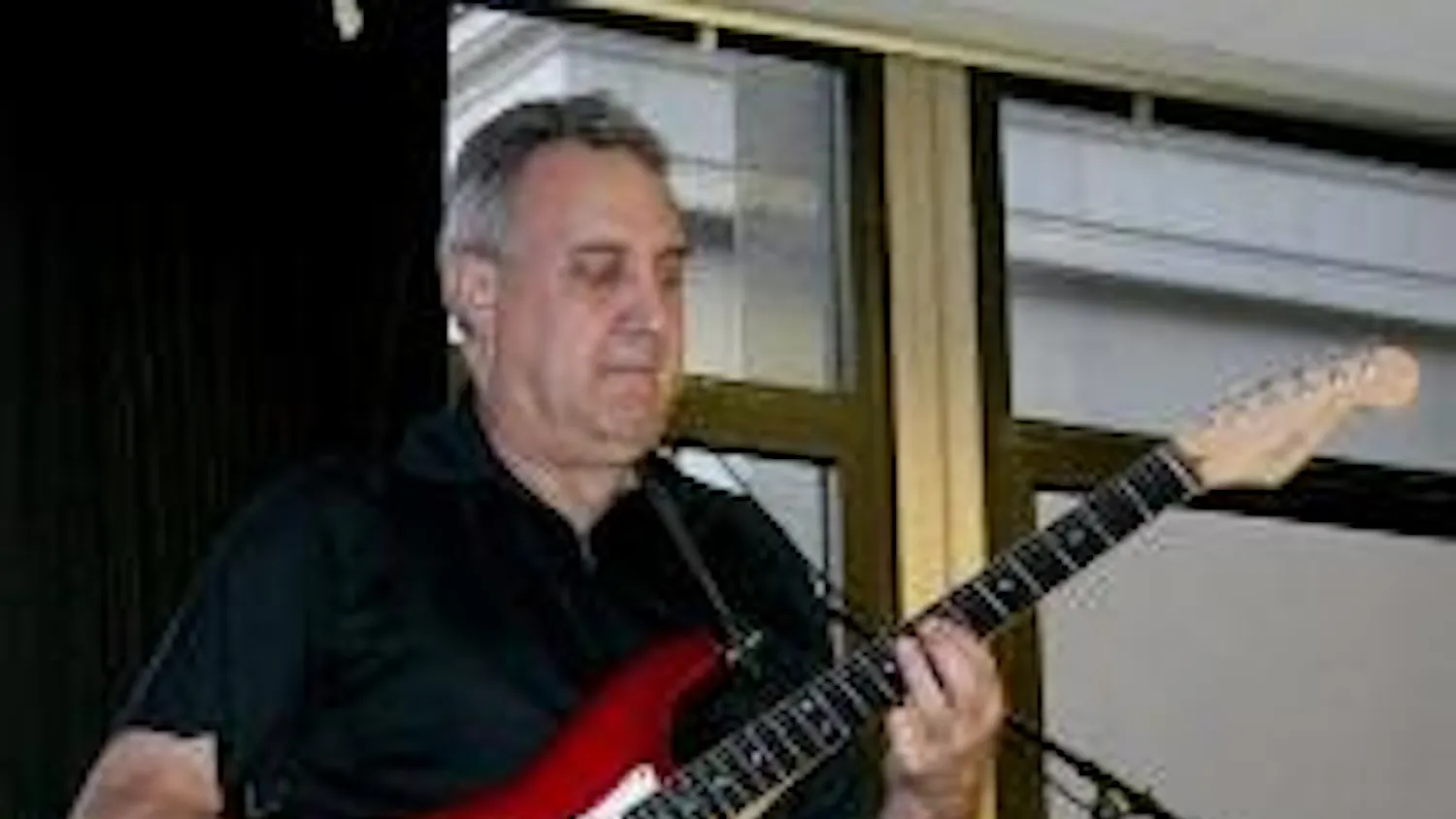 MAKIN' MUSIC- Mark Caruso jams on guitar, covering B.B. King with Ivers' band Zeebop in the first installment of the KPU series.