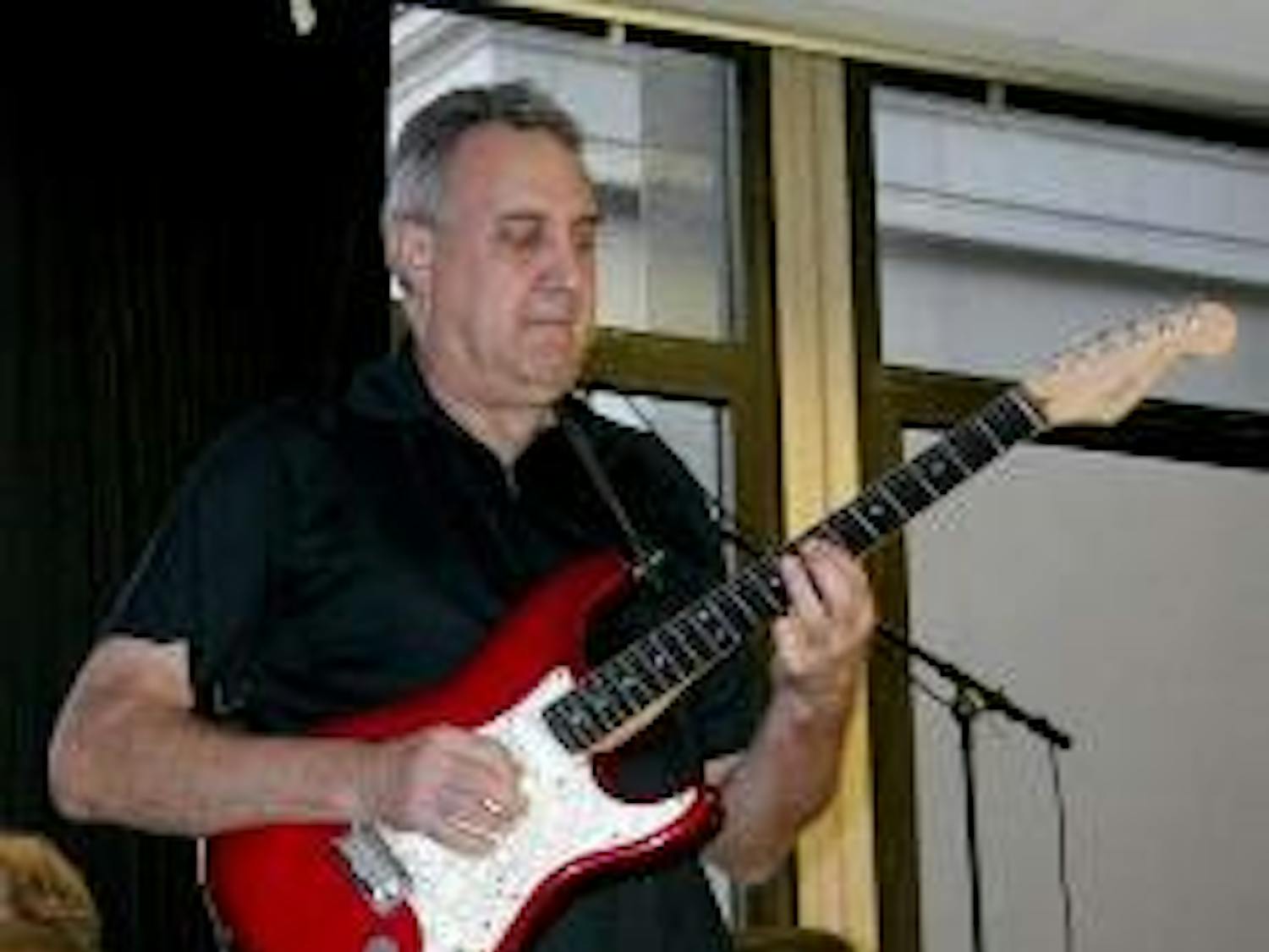 MAKIN' MUSIC- Mark Caruso jams on guitar, covering B.B. King with Ivers' band Zeebop in the first installment of the KPU series.