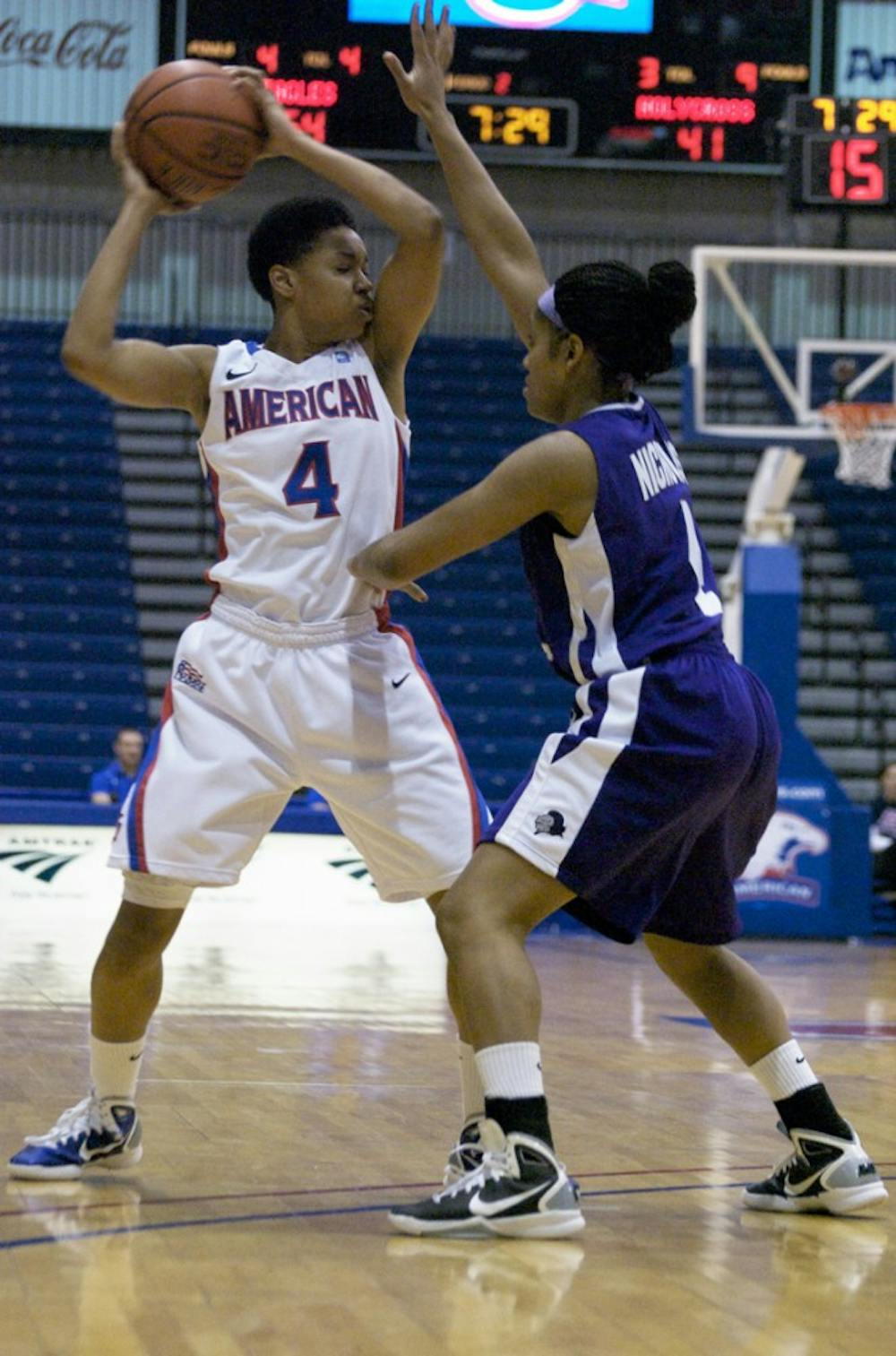 GRABBING AIR â€” Junior guard Lisa Strack goes up for a shot in AUâ€™s victory over the College of the Holy Cross on Saturday. Strack finished the 84-53 win with 18 points as well as four boards and two steals. 