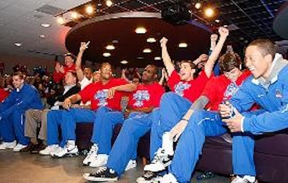COUCH POTATOES - Members of the AU men's basketball team react to their matchup against Villanova University during Sunday afternoon's NCAA Selection Show. The team plays in their second straight NCAA tournament tonight when they take on the Wildcats at t