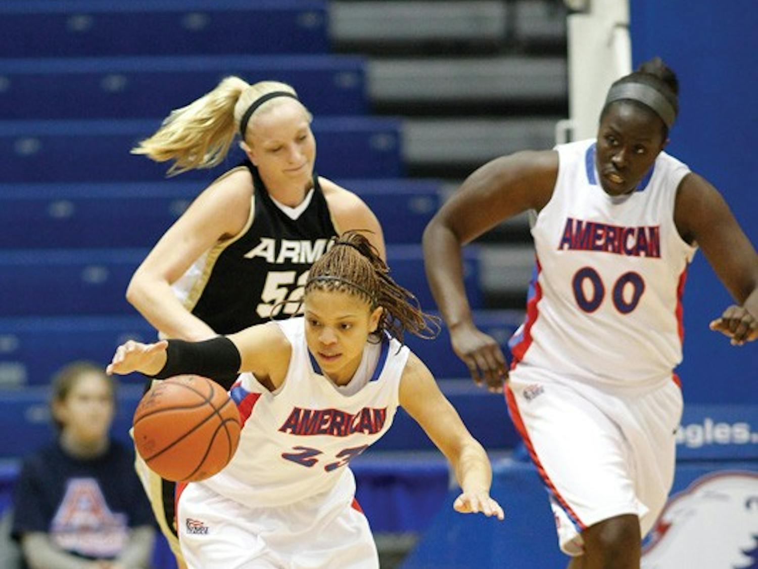 PROTECTING THE BALL — AU controls the basketball in their win over Colgate. WIth the commanding victory, they moved into sole posession of the Patriot League lead.