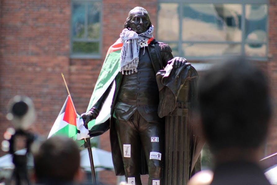 day 4 encampment - george statues with keffiyeh pic