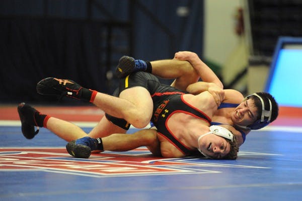 Kevin Tao, seen here against a December 2012 game with Maryland, won three matches at the NCAA Championships.