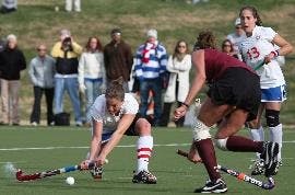 WINDING UP - Sophomore forward Christine Fingerhuth, No. 13, looks on as her teammate fires a shot towards goal on Tuesday.