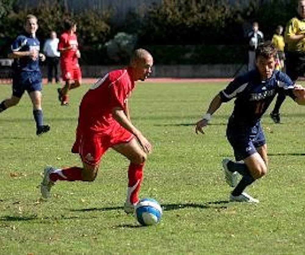 CACCAVALE CHARM- Former AU men's soccer team captain Sal Caccavale finesses his way down the field in one of his many games played on Reeves Field. Caccavale was recruited by Major League Soccer's Red Bull New York team in 2007, one semester before the se