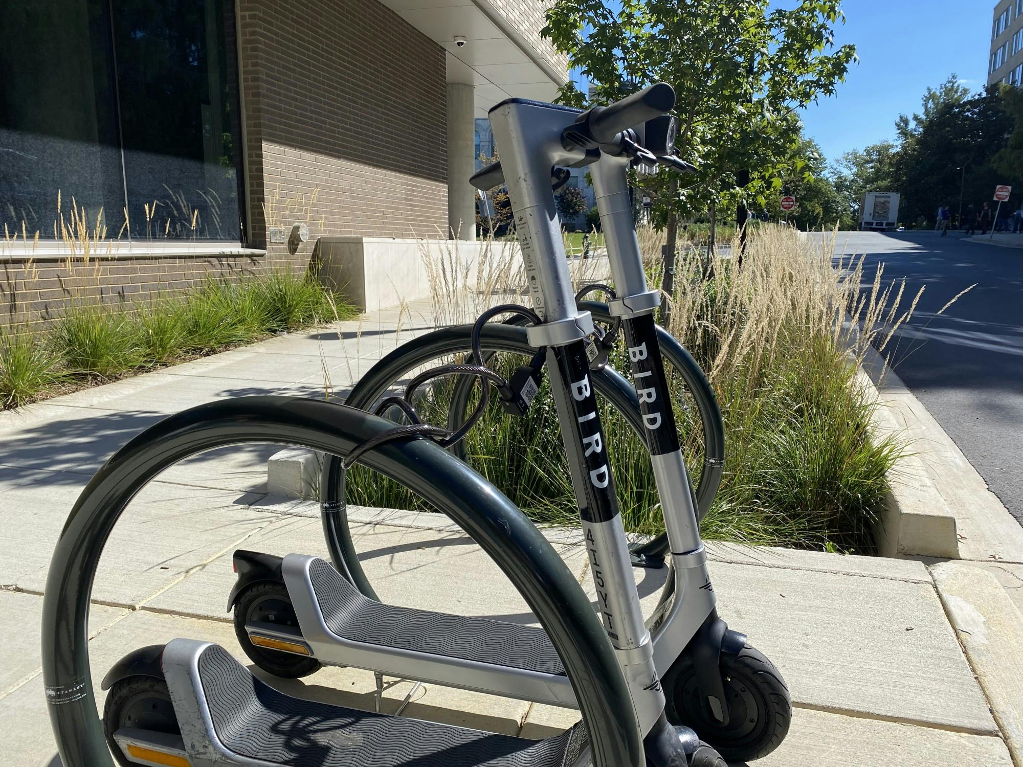 Lock scooter to bike sales rack