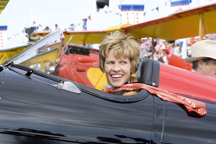 FLYING HIGH â€” Hilary Swank plays the world-renowned Amelia Earhart in her latest film, â€œAmelia.â€ Chronicling not only her successes but also her struggles in trying to fly in a male-dominated world, â€œAmeliaâ€ shows the literal ups and downs of women in aviation.