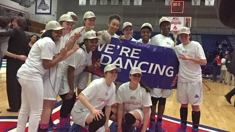The Eagles hold up a "We're Dancing" sign after beating Lehigh University in the Patriot League Championship.