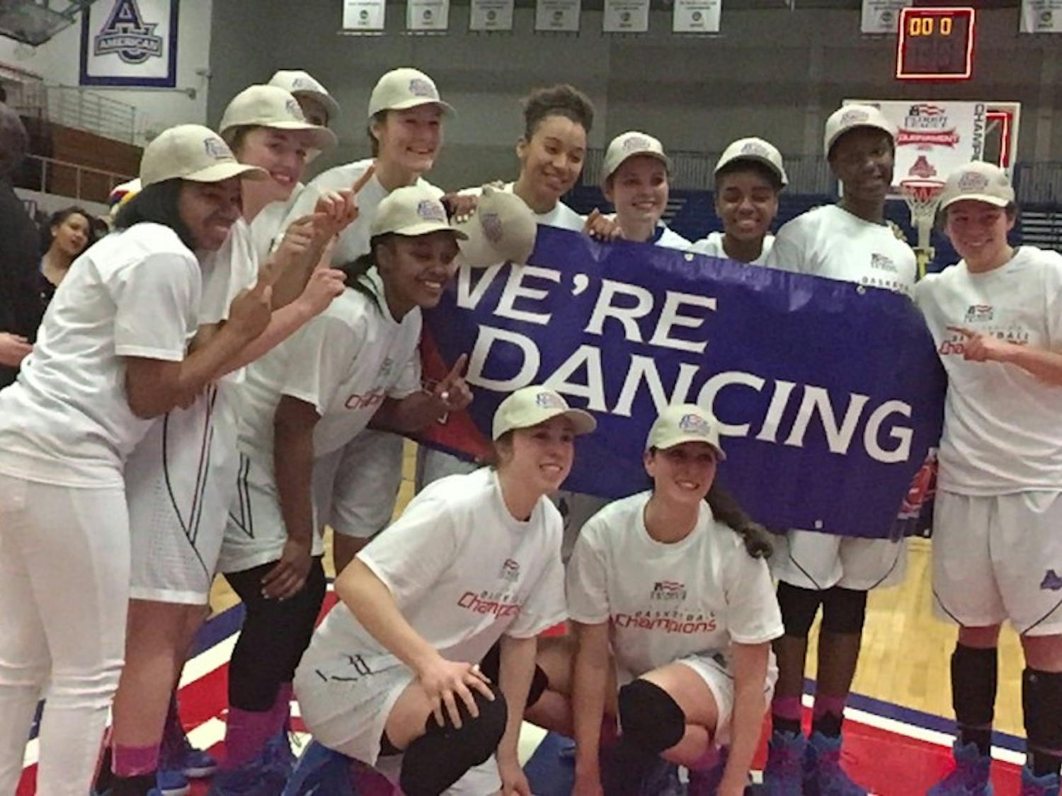 The Eagles hold up a "We're Dancing" sign after beating Lehigh University in the Patriot League Championship.