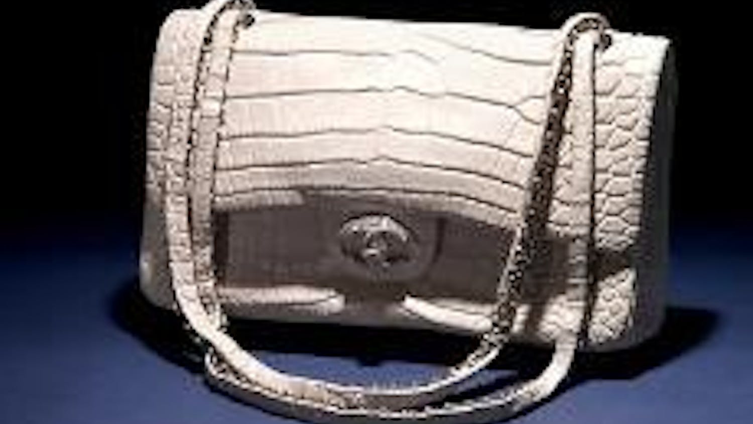 CROCO-DAZZLE - Chanel's Diamond Forever Classic Bag will set you back $261,000 but will launch you into the fashionista stratosphere. The diamond-encrusted handles weigh over three-and-a-half carats. Be one of the lucky 13 to own this jewel! Professionals