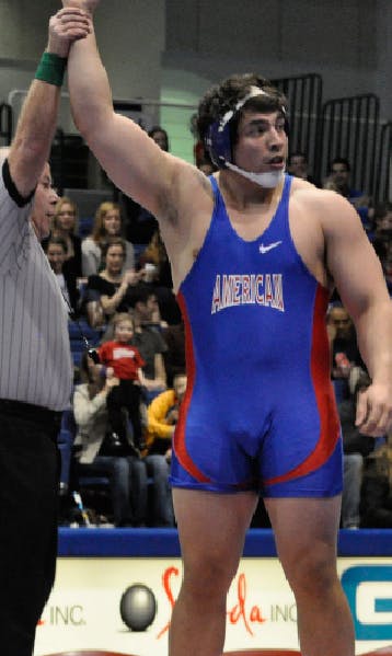 Ryan Flores had his arm raised on Senior Day to remain unbeaten.