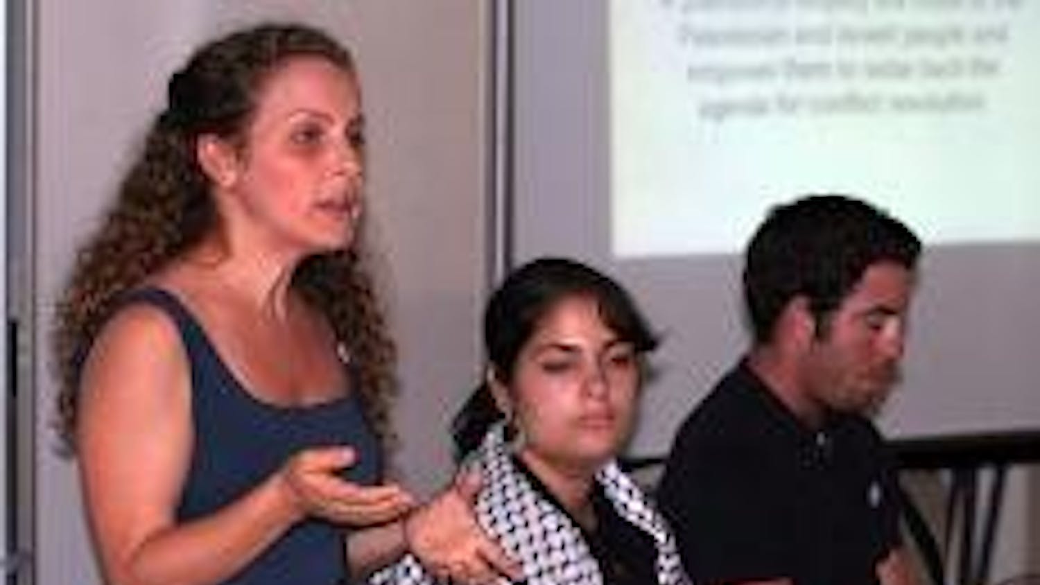 PROMOTING PEACE - Miriam Asnes, Shadha Musallam and Yaniv Rivlin, representatives from OneVoice, discuss the need for worldwide support of efforts to promote peace between Israel and Palestine.