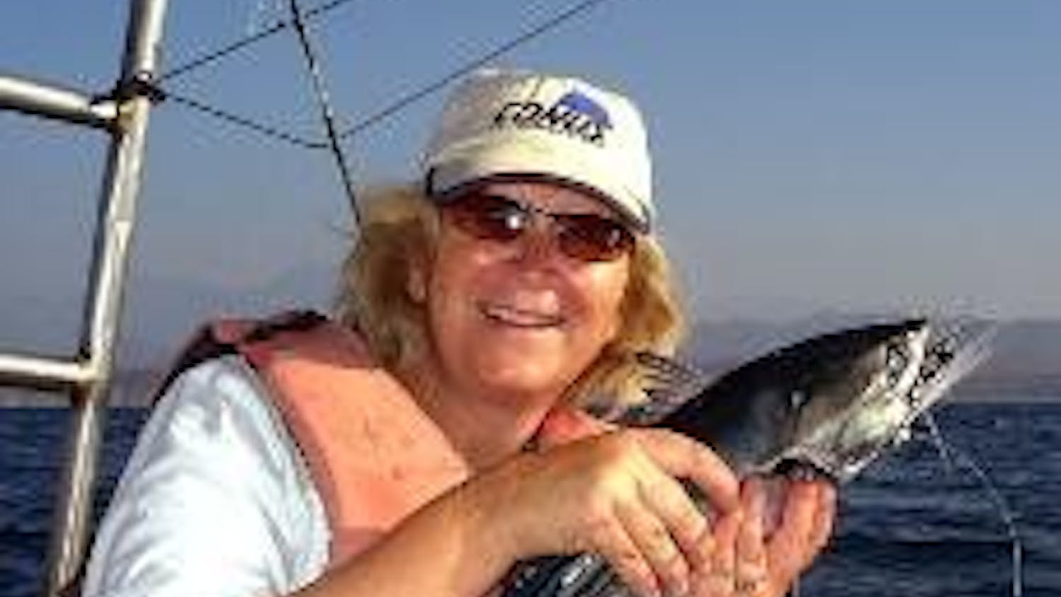 HOG WILD - Sarah Menke-Fish, a professor in the School of Communication, discusses growing up on a farm in Iowa, where she showed a pig in a "prettiest pig" contest.