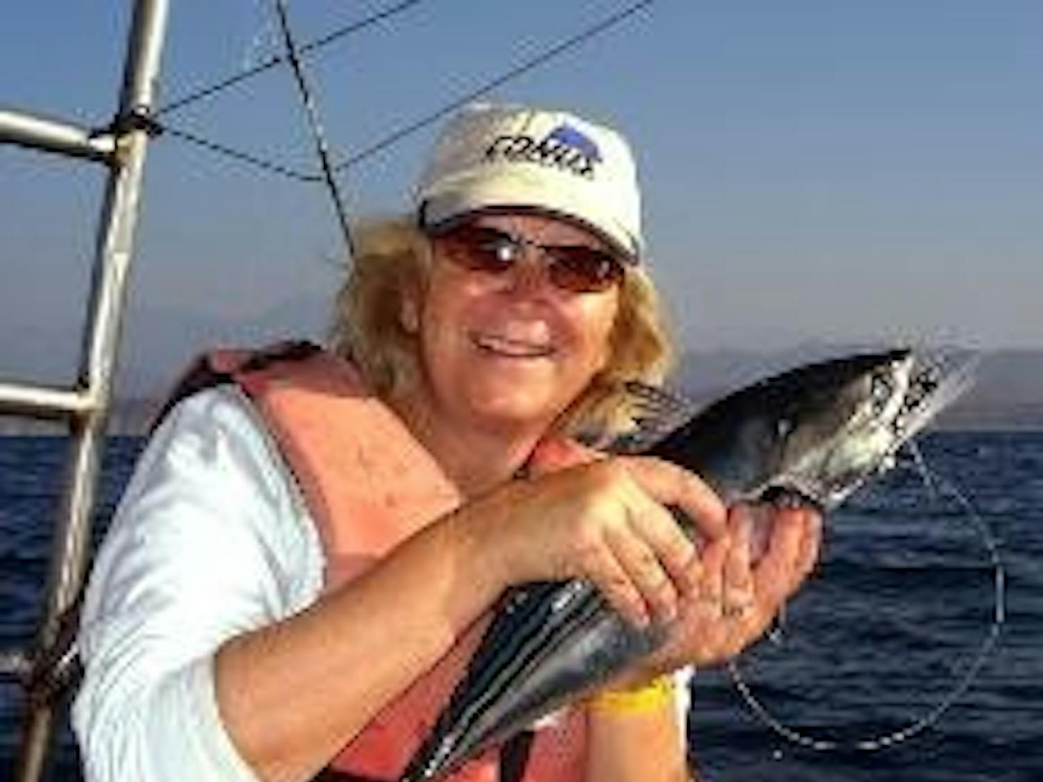 HOG WILD - Sarah Menke-Fish, a professor in the School of Communication, discusses growing up on a farm in Iowa, where she showed a pig in a "prettiest pig" contest.