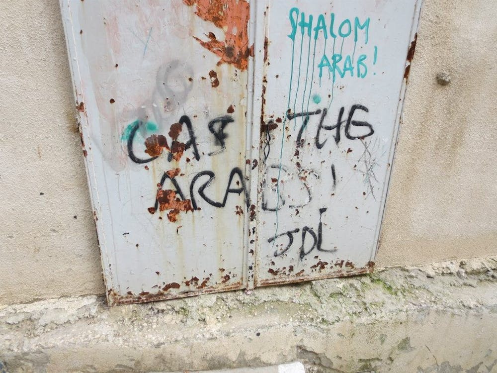 	A picture of graffiti that says &#8220;Gas the Arabs!&#8221; taken by Hank Pin while in Hebron. 