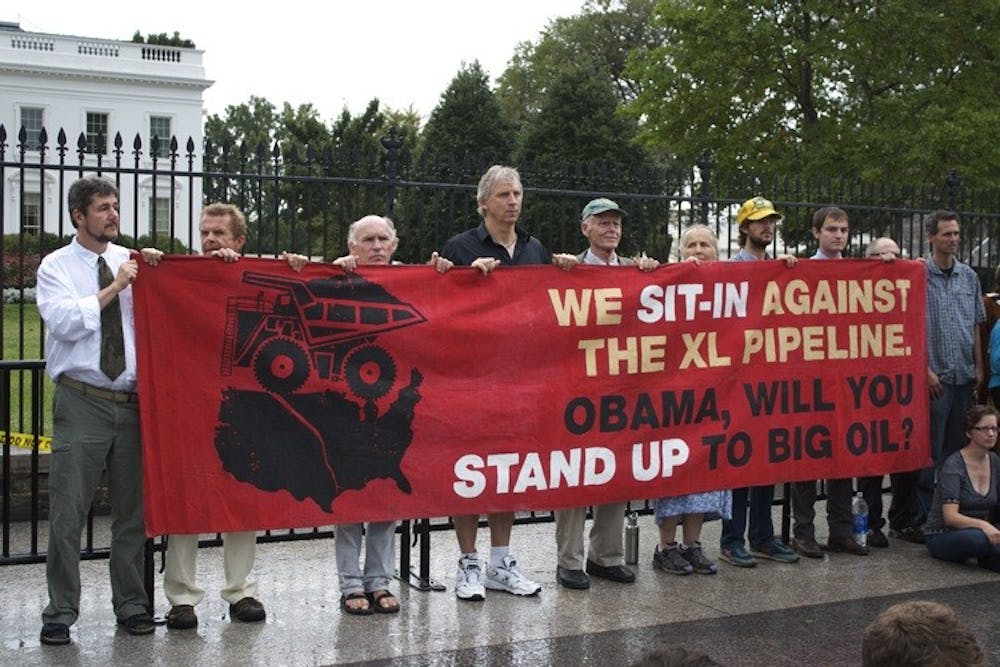 Protesters gathered outside the White House Sept. 3 to discourage President Barack Obama from supporting a proposed pipeline that would take tar sands oil from Alberta, Canada to Texas.