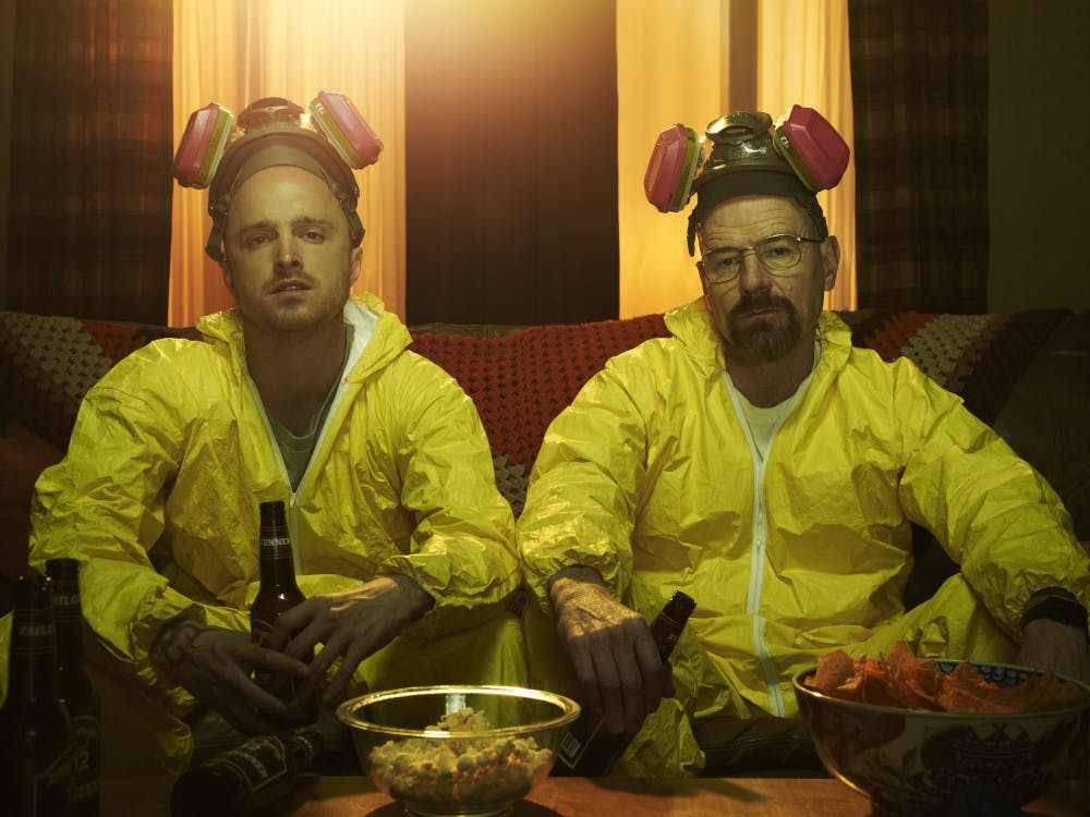 Jesse Pinkman (Aaron Paul) and Walter White (Bryan Cranston) - Breaking Bad _Season 5 - Photo Credit: Frank Ockenfels/AMC