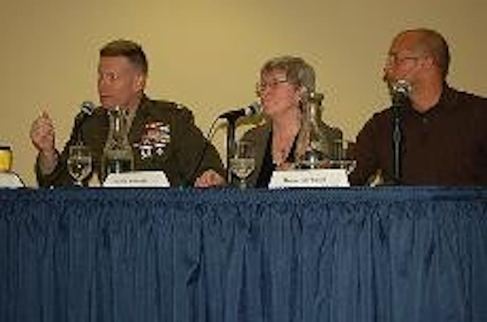 MEDIA AND MILITARY MIX - Col. Dave Lapan, director of the U.S. Marine Corps Public Affairs Headquarters, "Reporting War" author Sharon Schmickle and TIME.com reporter Darrin Mortenson discuss the relationship between the media and the military last night 