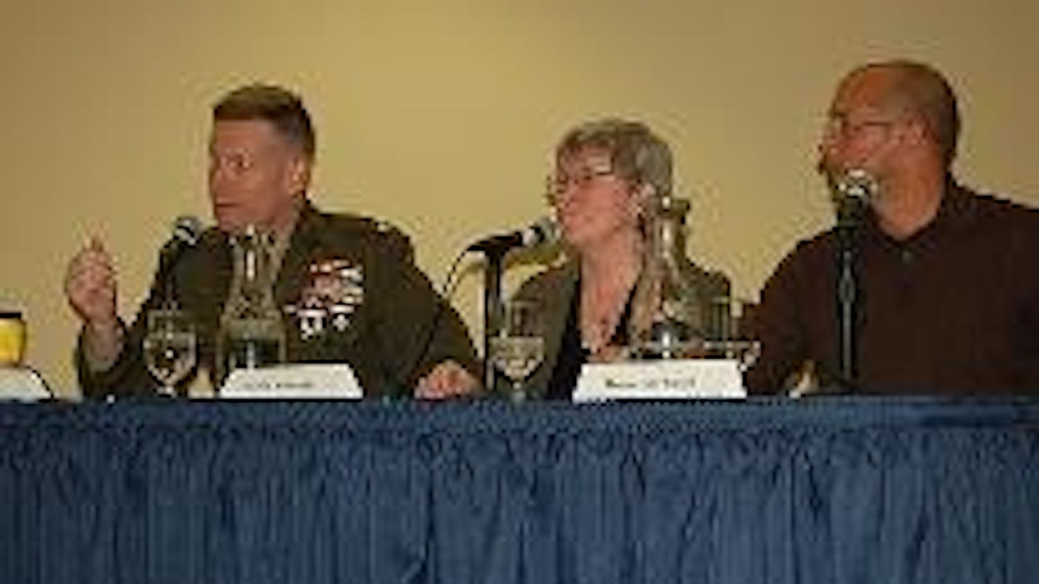 MEDIA AND MILITARY MIX - Col. Dave Lapan, director of the U.S. Marine Corps Public Affairs Headquarters, "Reporting War" author Sharon Schmickle and TIME.com reporter Darrin Mortenson discuss the relationship between the media and the military last night 
