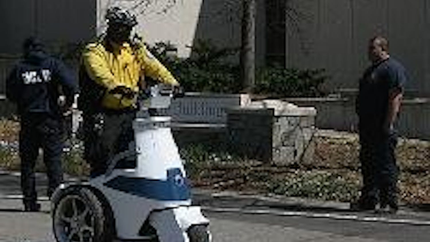 A NEW RIDE - A Public Safety officer rides past the Ward Circle Building on one of the office's new T3 scooters. They purchased three of the scooters and extra batteries for $34,000. The purchase replaced one Public Safety patrol car, according to Chief M