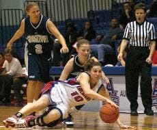 No. 10 Nicole Ryan scrambles for a loose ball in Saturday afternoon's  loss to Georgetown. 