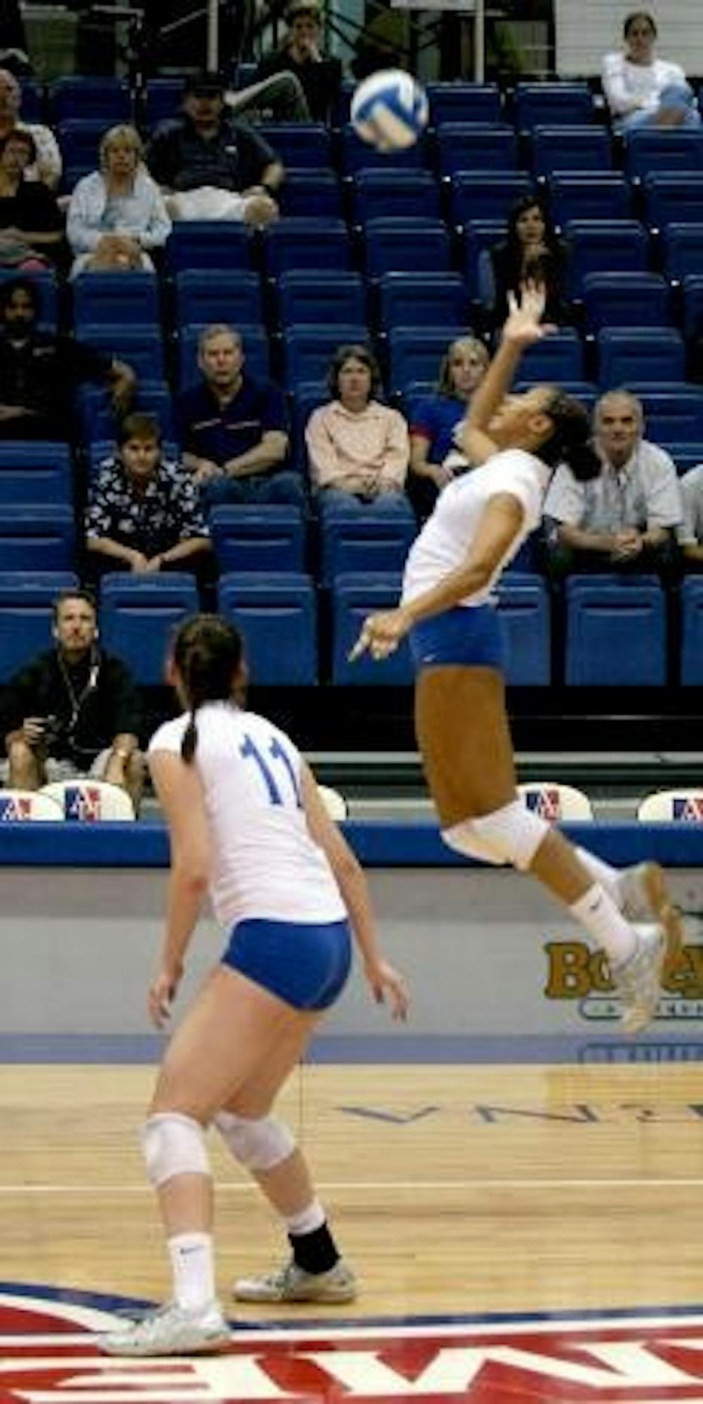 JUMP START- Senior Chelsa Brooks brings AU volleyball to new heights, jumping to return the ball, leading her team to victory. AU hosted the American Volleyball Tournament this past weekend in Bender.